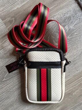 NWT Haute Shore Casey Crossbody Bag Beige Neoprene Red Green Black Accents